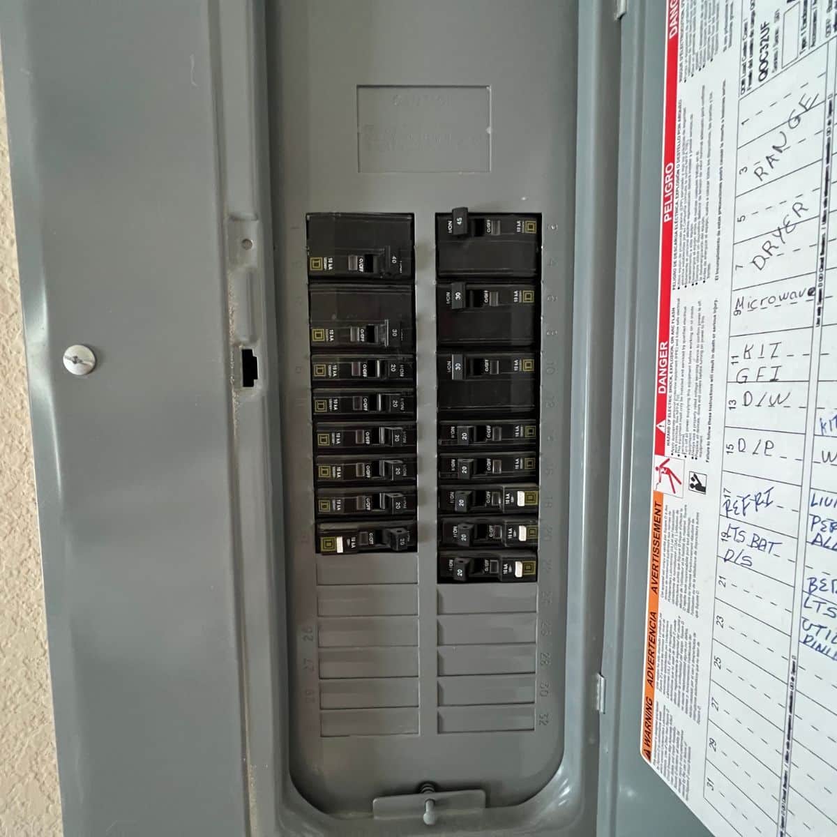 two rows of power switches inside the electrical power panel installed in a hammond residence