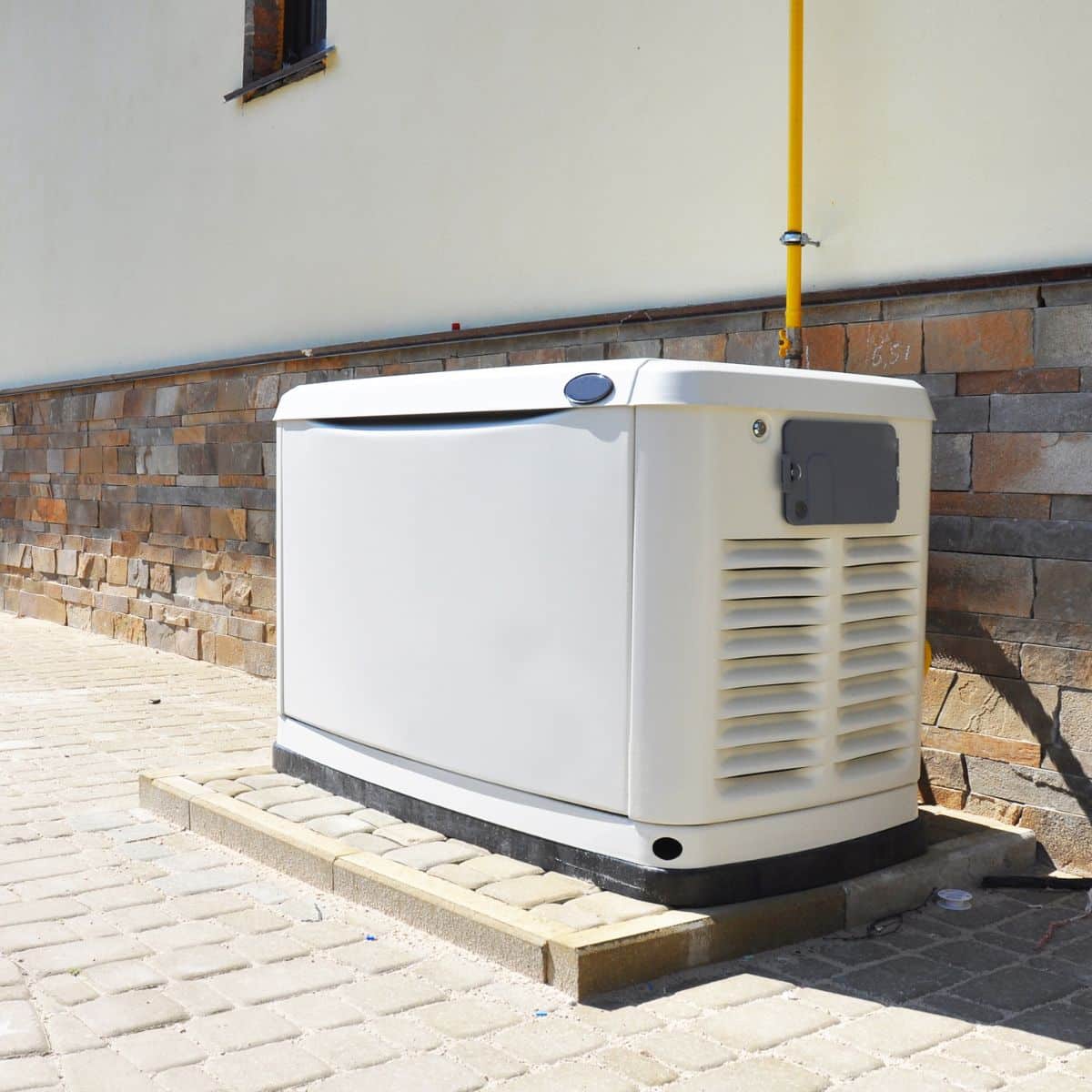 white generator installed outside a home in hammond, lousiana